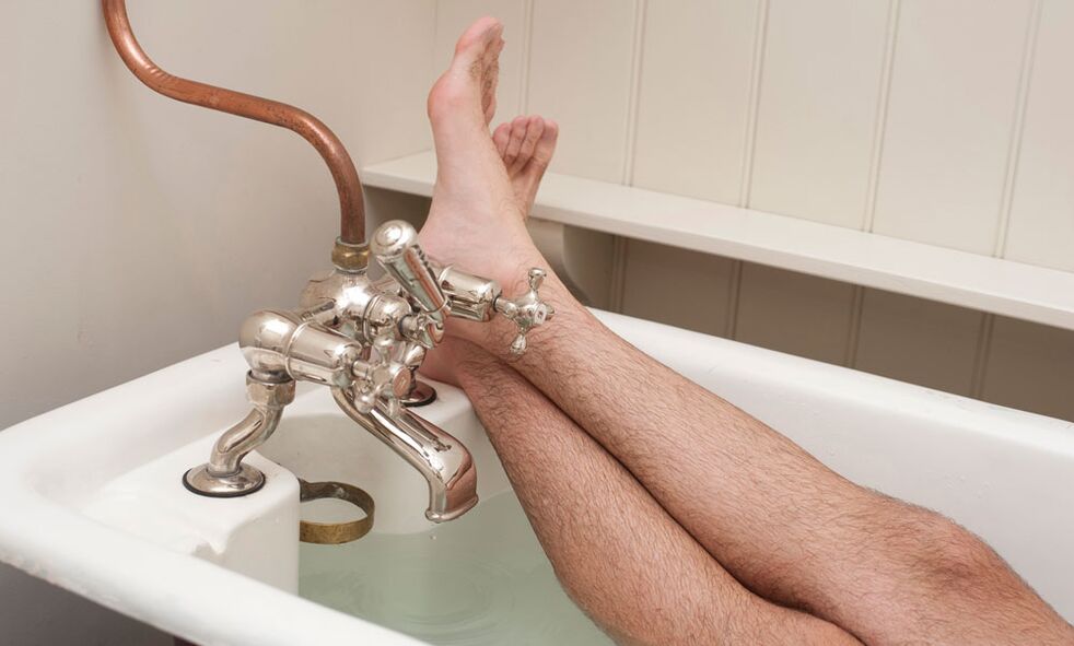 A man takes a bathroom with soda